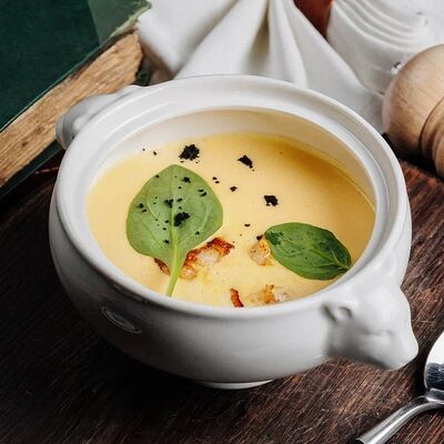 Сырный крем-суп с креветками в Охара по цене 540 ₽