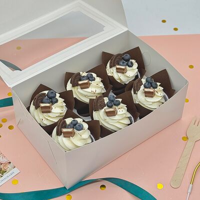 Капкейки с голубикой и Орео в Cosmo Сakery по цене 2100 ₽