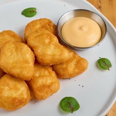 Наггетсы с сырным соусомв 4 сыра по цене 360 ₽