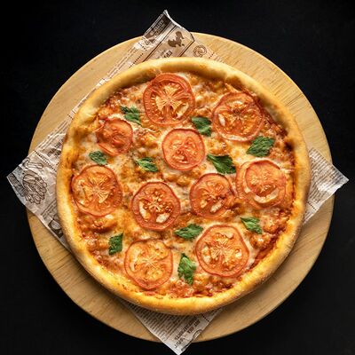 Пицца Маргарита в Wasabi по цене 607 ₽