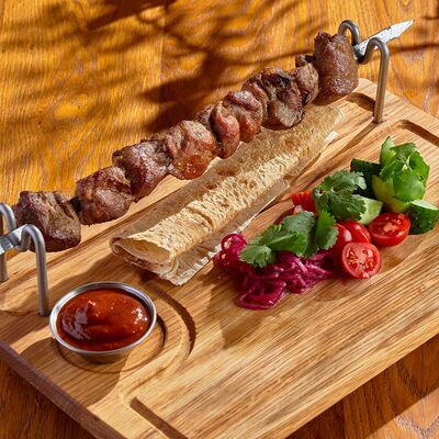 Шашлык из свинины в Munhell по цене 950 ₽