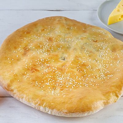Адыгейский пирог с сыром и зеленью в Пекарня Кулинария Пиццерия ОБОЖАЮТВСЕ! по цене 1199 ₽