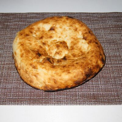 Узбекская лепешка в Шашлыки & Пироги по цене 70 ₽