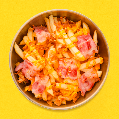 Картофель фри с беконом в сырном соусе в Чико по цене 385 ₽