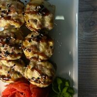 Запеченный ролл с крабом в Камчатка