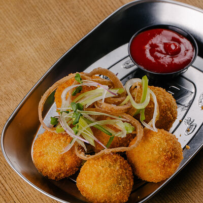 Крокеты картофельные с сыром и беконом в Кубанские пивоварни по цене 320 ₽