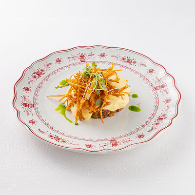 Тартар из говядины с белыми грибами в La Scala Trattoria Ignazio по цене 46 р.