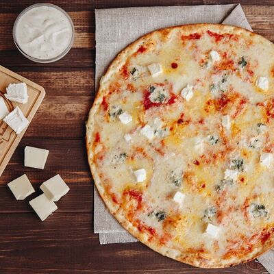 Пицца Сырная (Четыре Сыра) в Pizzburg по цене 18 р.