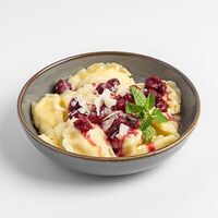 Вареники с творогом и кокосовым соусом с вишней в Kitchen