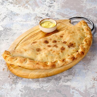 Пицца Кальцоне кон полло э фунги в Casa Mia Халва Тсуру по цене 775 ₽