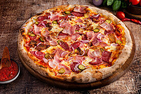 Пицца Deluxe в SushiKent по цене 950 ₽