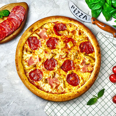 Пицца Мясная в Много лосося по цене 480