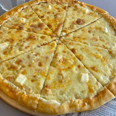 Пицца Четыре сыра в Белые ночи по цене 400 ₽