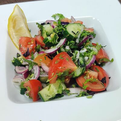 Салат Чобан по-кавказски в Кафе Вкус Востока по цене 530 ₽