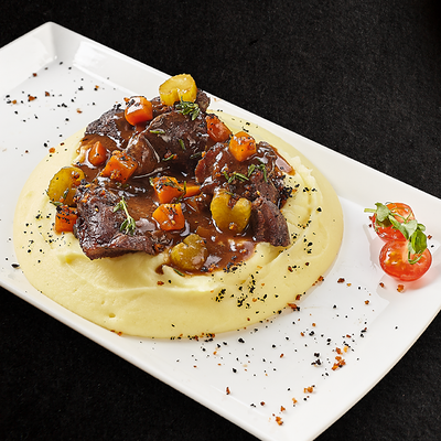 Томленые говяжьи щечки с пюре в Pronto Pizza по цене 970 ₽