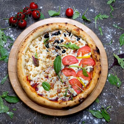 Пицца Четыре сезона в Кухня на районе по цене 350 ₽