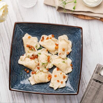 Вареники с картофелем и шкварками в Мука по цене 500 ₽