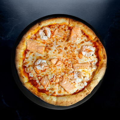 Пицца С морепродуктами в Berberry & ptichka по цене 850 ₽