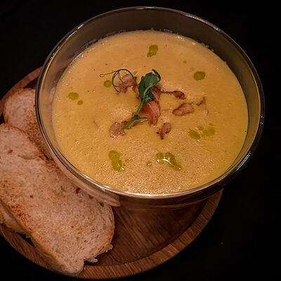 Кукурузный крем-суп с креветкой в Ostroff по цене 350 ₽