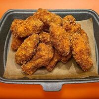 Куриные крылья в панировке в Mikser cafe Пицца & Шаурма