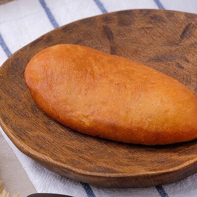 Пирожок жареный с картофелем и сосиской в Хлебница по цене 82 ₽