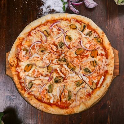 Пицца Морской коктейль в Panificio по цене 650 ₽