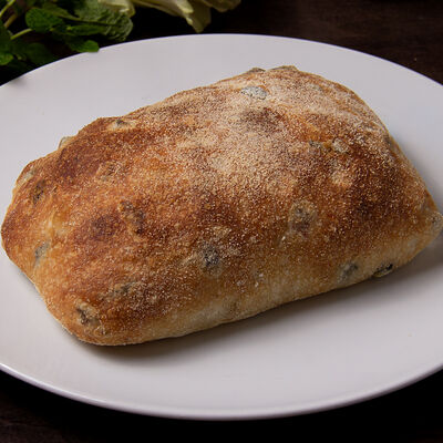 Чиабатта с маслинами, оливками, каперсами и вялеными томатами в La Maison гастробутик по цене 490 ₽