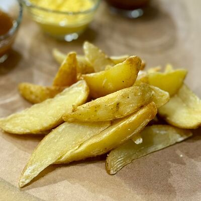 Картофель по-деревенски в Уфтанма по цене 199 ₽