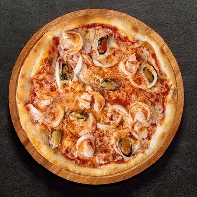 Пицца Морская 30 см в ПиццаПлюс по цене 1680 ₽