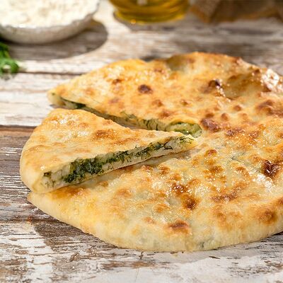 Картофель с зеленью 850 г в Пиросетия Осетинские пироги по цене 760 ₽