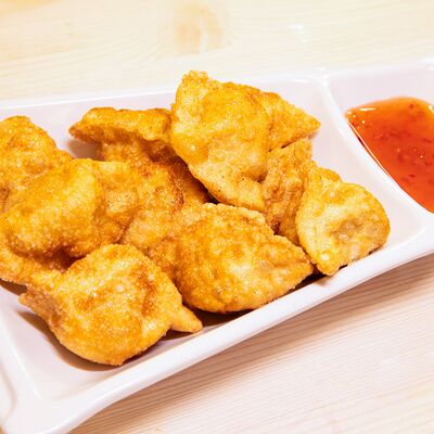 Пельмени жареные со свининой в Китайский фонарик по цене 580 ₽