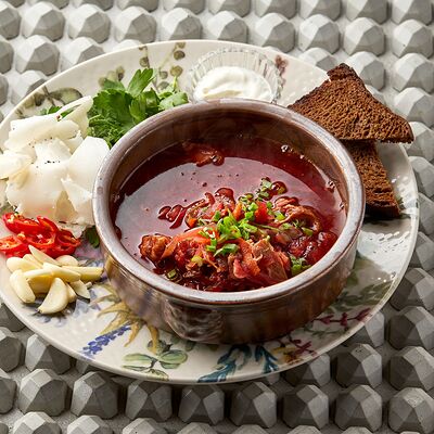 Борщ с говядиной в KITCHEN по цене 670 ₽