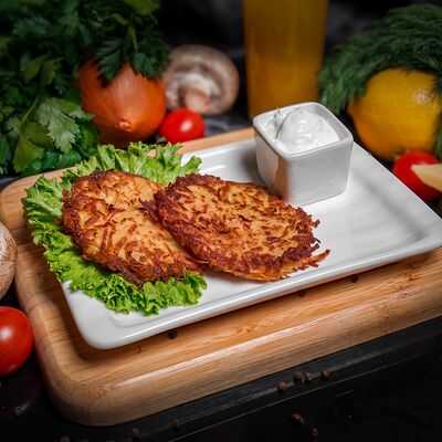 Детские драники со сметаной в Тесоро по цене 210 ₽