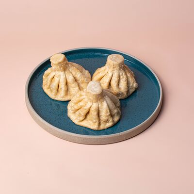 Обжаренные хинкали с говядиной и свининой в Tbls по цене 104 ₽