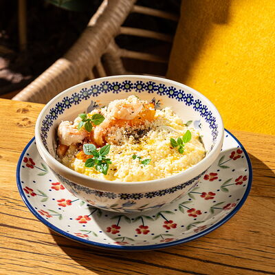 Кукурузная каша с креветками, тыквой и Пармезаном в Сыроварня по цене 530 ₽