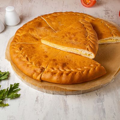 Осетинский пирог Три сыра в Хлебное место по цене 1200 ₽