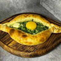 Хачапури по-аджарски с сыром и зеленью в Ай-вай
