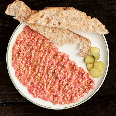 Тартар из говядины, пармезан в Dacha restaurant по цене 870 ₽