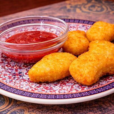 Куриные наггетсыв Тминъ по цене 190 ₽