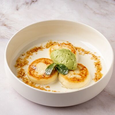 Сырники с фисташковым кремом в Кофейня Пенка по цене 420 ₽