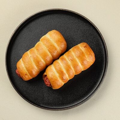 Сосиска куриная в тесте в Gost Food по цене 95 ₽