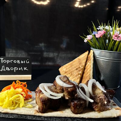Шашлык из свиной шеи в Торговый дворик по цене 920 ₽