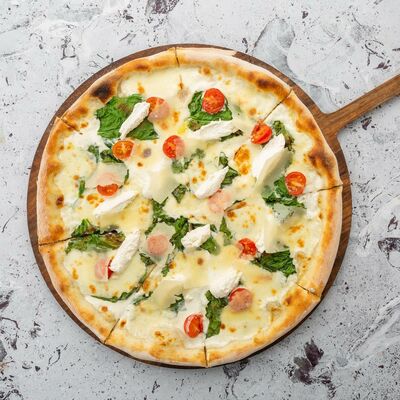 Пицца с рикоттой, шпинатом и помидорини в Italy по цене 490