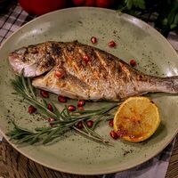 Дорадо на мангале в Мзиани