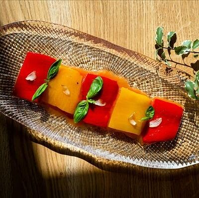 Запеченные перцы с соусом ромеско в Omela по цене 925 ₽