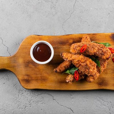 Куриные стрипсы в Мангал по цене 345 ₽