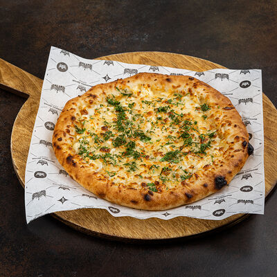 Пицца сырная с зеленью в Город детей по цене 932 ₽