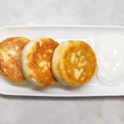 Сырники со сметаной в Bonape по цене 339 ₽