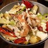 Теплый салат с креветками и кальмаром в Lars Vegans по цене 860