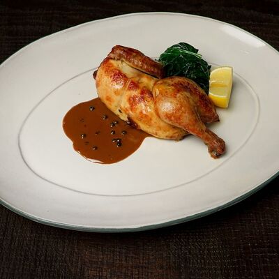 Курица на вертеле, соус из зелёного перца в Dacha restaurant по цене 1080 ₽